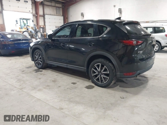 2017 Mazda CX-5 Grand Touring with VIN JM3KFBDL6H0143013, listed as a IAAI auction lot 41912979 with 122,890 mi miles. Bid and sale history available at carsss.com. Image 3.