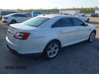 2013 Ford Taurus SEL z VIN 1FAHP2E88DG214441, wystawiony jako IAAI lot #42232859 z przebiegiem 122 388 mil mil oraz . Historia ofert i sprzedaży dostępna na DreamBid. Obrazek 4.