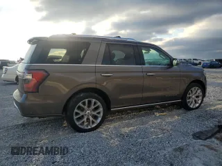 2019 Ford Expedition Platinum with VIN 1FMJU1LTXKEA56503, listed as a Copart auction lot 45657785 with 104,839 mi miles and Salvage Title. Bid and sale history available at carsss.com. Image 3.