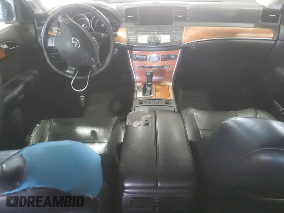 2007 Infiniti M x z VIN JNKAY01F37M456012, wystawiony jako Copart lot #58978165 z przebiegiem 290 083 mil mil oraz Szkoda całkowita • Salvage title. Historia ofert i sprzedaży dostępna na DreamBid. Obrazek 8.