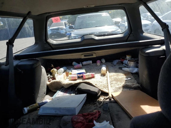 1996 Subaru Legacy with VIN 4S3BG4859T6986223, listed as a Copart auction lot 57683345 with 265,568 mi miles and Salvage title. Bid and sale history available at DreamBid. Image 10.