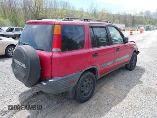 2000 Honda CR-V LX with VIN JHLRD184XYC010847, listed as a IAAI auction lot 42080100 with 256,678 mi miles and . Bid and sale history available at carsss.com. Image 4.