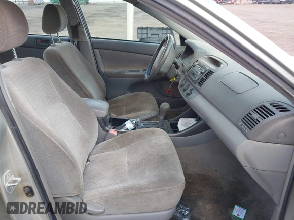 2004 Toyota Camry LE with VIN JTDBE32K640257695, listed as a IAAI auction lot 41837872 with 214,917 mi miles. Bid and sale history available at carsss.com. Image 5.