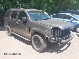 2013 GMC Yukon SLT with VIN 1GKS2CE04DR290293, listed as a IAAI auction lot 39620358 with 167,664 mi miles. Bid and sale history available at carsss.com. Image 1.