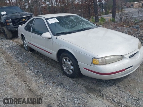 1997 Ford Thunderbird LX z VIN 1FALP62W6VH142784, wystawiony jako IAAI lot #41792883 z przebiegiem 244 300 mil mil oraz . Historia ofert i sprzedaży dostępna na DreamBid. Obrazek 1.