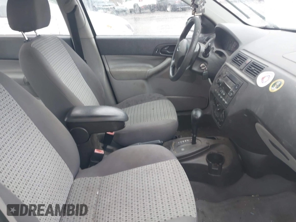 2007 Ford Focus S z VIN 1FAFP34N77W336075, wystawiony jako IAAI lot #42325783 z przebiegiem 153 194 mil mil oraz . Historia ofert i sprzedaży dostępna na DreamBid. Obrazek 5.