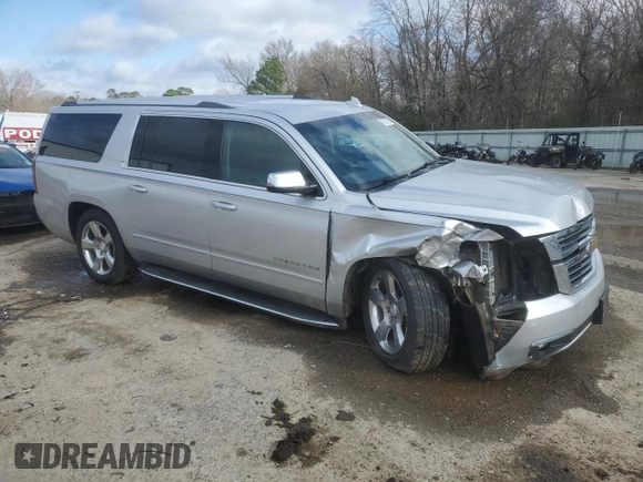 2017 Chevrolet Suburban Premier with VIN 1GNSCJKC2HR120815, listed as a Copart auction lot 43729155 with 96,553 mi miles and Salvage title. Bid and sale history available at DreamBid. Image 4.