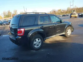 2011 Ford Escape XLT with VIN 1FMCU9DG4BKC30933, listed as a IAAI auction lot 40828476 with 146,808 mi miles. Bid and sale history available at carsss.com. Image 4.