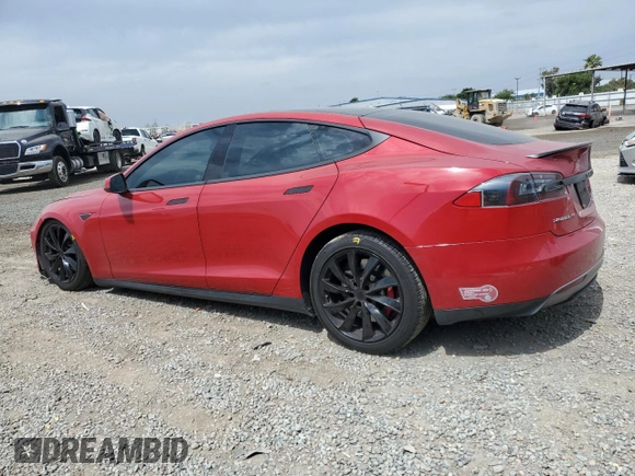 2016 Tesla Model S 90D with VIN 5YJSA1E42GF127593, listed as a Copart auction lot 52450495 with 144,151 mi miles and Salvage title. Bid and sale history available at DreamBid. Image 2.