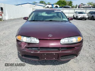 2003 Oldsmobile Aurora z VIN 1G3GS64C134163544, wystawiony jako Copart lot #58706705 z przebiegiem 104 447 mil mil oraz Szkody całkowita. Historia ofert i sprzedaży dostępna na DreamBid. Obrazek 5.