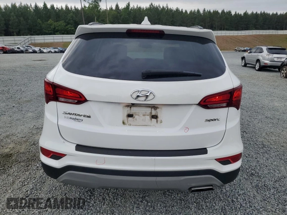 2018 Hyundai Santa Fe 2.4L z VIN 5NMZU3LB6JH104469, wystawiony jako Copart lot #57587495 z przebiegiem 78 267 mil mil oraz Szkoda całkowita • Salvage title. Historia ofert i sprzedaży dostępna na DreamBid. Obrazek 6.