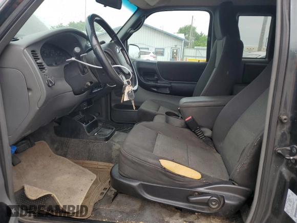 2004 Ford Ranger XL Fleet with VIN 1FTYR15EX4PA53062, listed as a Copart auction lot 60978085 with 284,844 mi miles and Clean title. Bid and sale history available at DreamBid. Image 7.