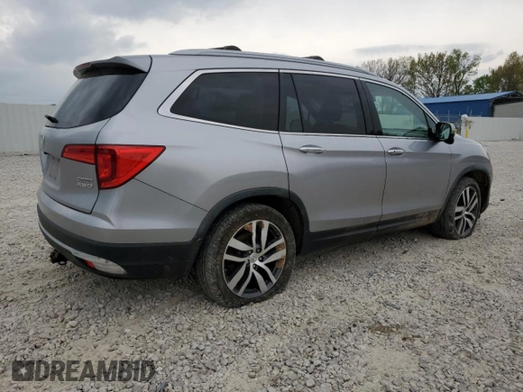 2017 Honda Pilot Touring z VIN 5FNYF6H92HB006855, wystawiony jako Copart lot #53650655 z przebiegiem 130 732 mil mil oraz Szkoda całkowita • Salvage title. Historia ofert i sprzedaży dostępna na DreamBid. Obrazek 3.
