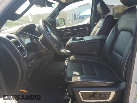 2023 Ram 1500 Laramie with VIN 1C6SRFRT0PN641605, listed as a Copart auction lot 70271924 with 17,917 mi miles and Salvage title. Bid and sale history available at DreamBid. Image 7.