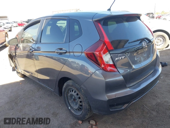 2018 Honda Fit LX with VIN 3HGGK5H51JM731851, listed as a IAAI auction lot 42570144 with 69,236 mi miles and . Bid and sale history available at DreamBid. Image 3.