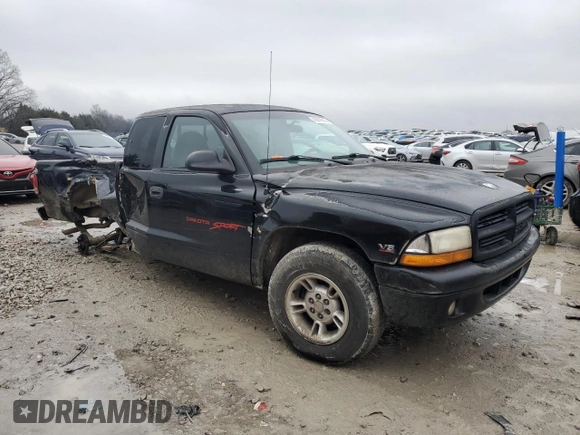 1999 Dodge Dakota SLT with VIN 1B7GL22X0XS275846, listed as a Copart auction lot 42619635 with 176,527 mi miles and Salvage Title. Bid and sale history available at carsss.com. Image 4.