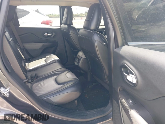 2014 Jeep Cherokee Limited with VIN 1C4PJLDBXEW183095, listed as a IAAI auction lot 41814496 with 89,589 mi miles and . Bid and sale history available at DreamBid. Image 8.