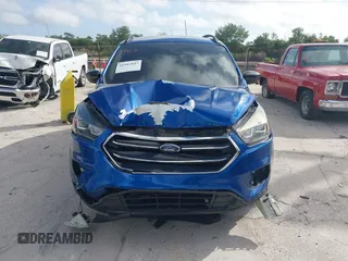 2018 Ford Escape SE z VIN 1FMCU0GD2JUC27271, wystawiony jako IAAI lot #41947047 z przebiegiem 154 672 mil mil oraz . Historia ofert i sprzedaży dostępna na DreamBid. Obrazek 12.