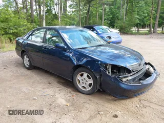 2002 Toyota Camry XLE z VIN 4T1BF30K12U534593, wystawiony jako IAAI lot #42271736 z przebiegiem 262 807 mil mil oraz . Historia ofert i sprzedaży dostępna na DreamBid. Obrazek 1.