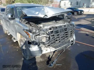 2022 Toyota Tundra 4WD Limited with VIN 5TFJA5DB9NX056009, listed as a IAAI auction lot 40820514 with 27,418 mi miles. Bid and sale history available at carsss.com. Image 6.