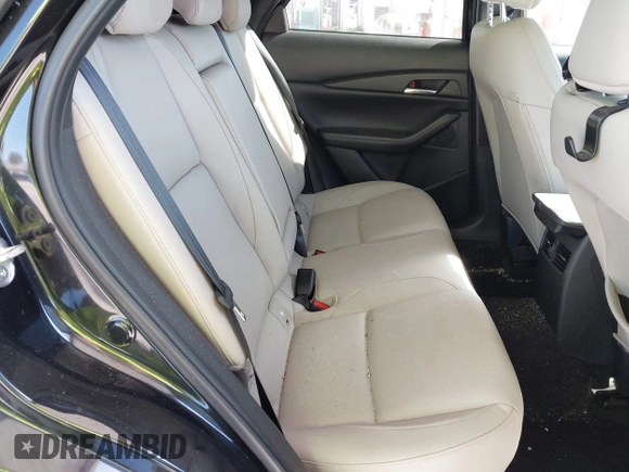 2022 Mazda CX-30 2.5 Turbo with VIN 3MVDMBAY3NM440688, listed as a IAAI auction lot 40860258 with 27,445 mi miles and . Bid and sale history available at DreamBid. Image 8.