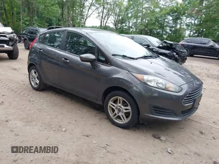 2018 Ford Fiesta SE z VIN 3FADP4EJ7JM124423, wystawiony jako IAAI lot #42493768 z przebiegiem 191 889 mil mil oraz . Historia ofert i sprzedaży dostępna na DreamBid. Obrazek 1.