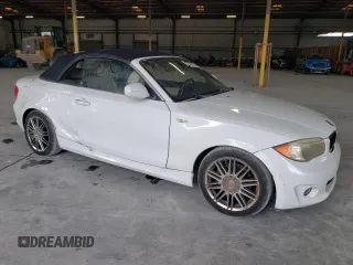 2012 BMW 1 Series 128i with VIN WBAUN1C5XCVH84372, listed as a Copart auction lot 54162815 with 127,420 mi miles and Clean title. Bid and sale history available at DreamBid. Image 4.