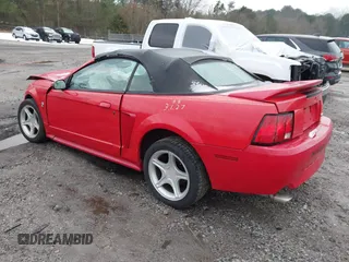 1999 Ford Mustang GT z VIN 1FAFP45XXXF127807, wystawiony jako IAAI lot #41302411 z przebiegiem 156 680 mil mil oraz . Historia ofert i sprzedaży dostępna na DreamBid. Obrazek 3.