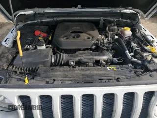 2020 Jeep Wrangler Unlimited Sahara with VIN 1C4HJXEN5LW207076, listed as a Copart auction lot 59461645 with 57,559 mi miles and Salvage title. Bid and sale history available at DreamBid. Image 11.