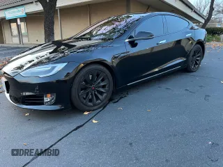 2017 Tesla Model S 60 with VIN 5YJSA1E15HF219286, listed as a Copart auction lot 84771024 with 43,259 mi miles and Salvage title. Bid and sale history available at DreamBid. Image 2.