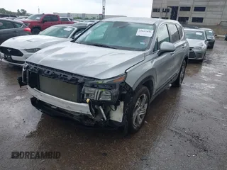2023 Hyundai Santa Fe SE with VIN 5NMS14AJ5PH626769, listed as a IAAI auction lot 42637931 with 10,712 mi miles and . Bid and sale history available at DreamBid. Image 2.