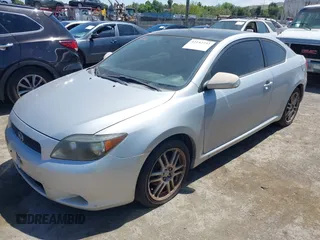 2006 Scion tC with VIN JTKDE177660068512, listed as a IAAI auction lot 42142732 with 304,731 mi miles. Bid and sale history available at carsss.com. Image 2.