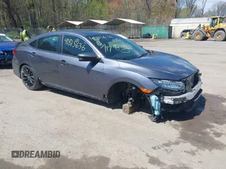 2020 Honda Civic Si z VIN 2HGFC1E53LH704576, wystawiony jako IAAI lot #41979301 z przebiegiem 59 245 mil mil oraz . Historia ofert i sprzedaży dostępna na DreamBid. Obrazek 1.