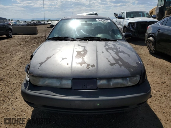 1998 Saturn SL с VIN 1G8ZH528XWZ140961, выставлен на аукционе Copart как лот 61259575 с пробегом 237 291 миль миль и Списание • Salvage title. История ставок и продаж доступна на DreamBid. Изображение 5.