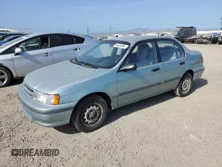 1994 Toyota Tercel DX z VIN JT2EL43T6R0457122, wystawiony jako Copart lot #54426595 z przebiegiem 201 177 mil mil oraz Czysty tytuł • Clean title. Historia ofert i sprzedaży dostępna na DreamBid. Obrazek 1.