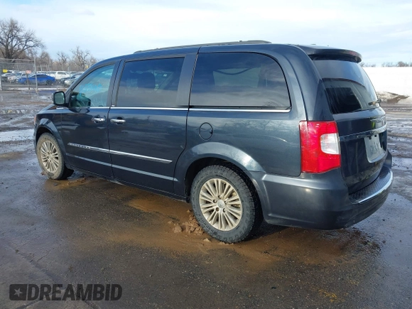 2014 Chrysler Town & Country Touring-L with VIN 2C4RC1CG4ER330072, listed as a IAAI auction lot 41533640 with 131,253 mi miles. Bid and sale history available at carsss.com. Image 3.