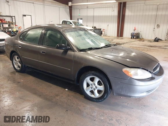 2003 Ford Taurus SE Standard z VIN 1FAFP53UX3G167579, wystawiony jako IAAI lot #42140606 z przebiegiem 178 147 mil mil oraz . Historia ofert i sprzedaży dostępna na DreamBid. Obrazek 1.