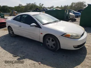 2002 Mercury Cougar z VIN 1ZWFT61L425621799, wystawiony jako Copart lot #54654305 z przebiegiem 159 209 mil mil oraz Szkoda całkowita • Salvage title. Historia ofert i sprzedaży dostępna na DreamBid. Obrazek 4.