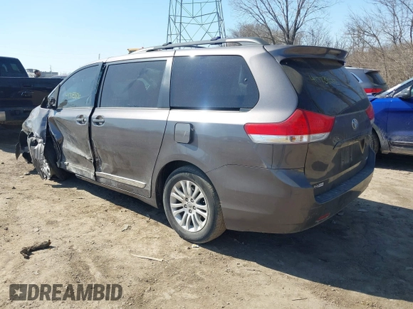 2012 Toyota Sienna XLE AAS with VIN 5TDYK3DC9CS227319, listed as a IAAI auction lot 41773806 with 178,803 mi miles and . Bid and sale history available at carsss.com. Image 3.