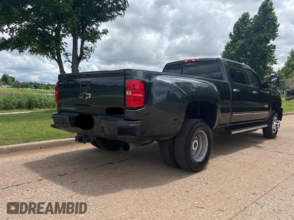 2017 Chevrolet Silverado 3500HD High Country with VIN 1GC4K1EY9HF160774, listed as a Copart auction lot 58665585 with 388,613 mi miles and Clean title. Bid and sale history available at DreamBid. Image 4.