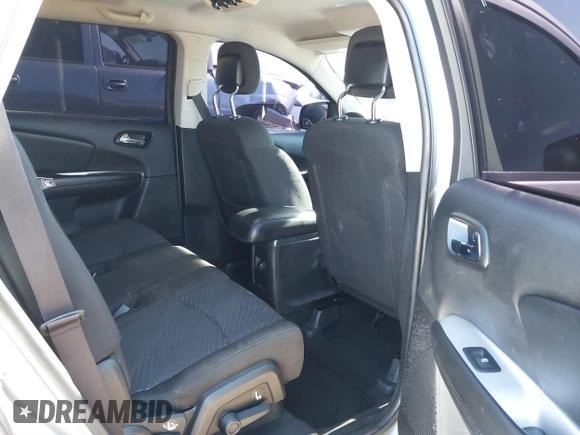 2019 Dodge Journey SE with VIN 3C4PDCBG0KT701223, listed as a IAAI auction lot 41286446 with 71,572 mi miles and . Bid and sale history available at DreamBid. Image 8.