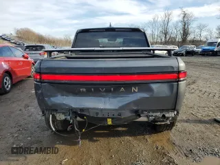 2022 Rivian R1T Adventure Package with VIN 7FCTGAAAXNN005667, listed as a Copart auction lot 44321435 with 48,249 mi miles and Salvage Title. Bid and sale history available at carsss.com. Image 6.