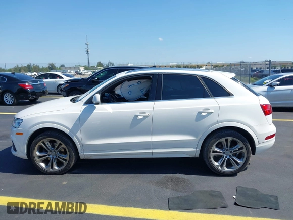2016 Audi Q3 Premium Plus with VIN WA1BFCFS0GR014028, listed as a IAAI auction lot 42274987 with 64,667 mi miles and . Bid and sale history available at DreamBid. Image 14.