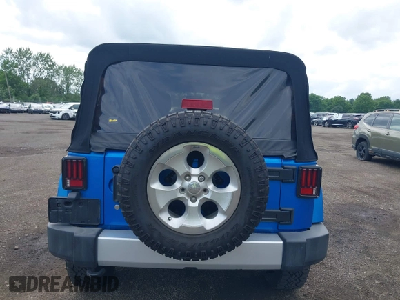 2015 Jeep Wrangler Unlimited Sahara with VIN 1C4BJWEG4FL677879, listed as a IAAI auction lot 42676097 with 85,821 mi miles and . Bid and sale history available at DreamBid. Image 16.