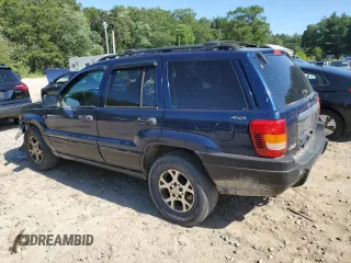 2000 Jeep Grand Cherokee Laredo with VIN 1J4GW48S2YC398116, listed as a Copart auction lot 61828385 with 251,791 mi miles and Clean title. Bid and sale history available at DreamBid. Image 2.