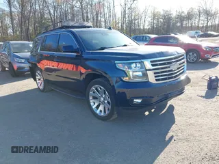 2020 Chevrolet Tahoe LT z VIN 1GNSKBKC3LR136703, wystawiony jako IAAI lot #41975271 z przebiegiem 82 211 mil mil oraz . Historia ofert i sprzedaży dostępna na DreamBid. Obrazek 1.