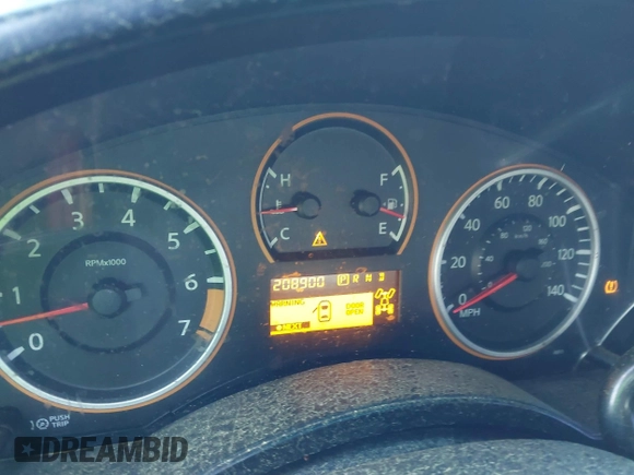 2010 Nissan Titan XE with VIN 1N6AA0EJ4AN311838, listed as a IAAI auction lot 41789366 with 208,900 mi miles. Bid and sale history available at carsss.com. Image 7.