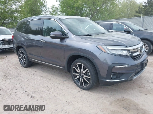 2020 Honda Pilot Elite with VIN 5FNYF6H00LB027472, listed as a IAAI auction lot 42253478 with 69,988 mi miles and . Bid and sale history available at DreamBid. Image 1.