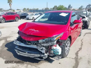 2020 Toyota Prius LE with VIN JTDKARFP8L3154280, listed as a IAAI auction lot 42405444 with 57,134 mi miles and . Bid and sale history available at DreamBid. Image 2.