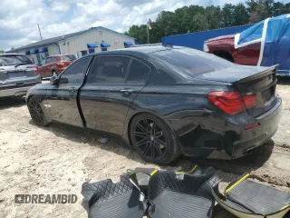 2014 BMW 7 Series 740Li with VIN WBAYE4C53ED137952, listed as a Copart auction lot 62829515 with 151,160 mi miles and Salvage title. Bid and sale history available at DreamBid. Image 2.